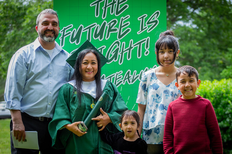 Student with family during Graduation.